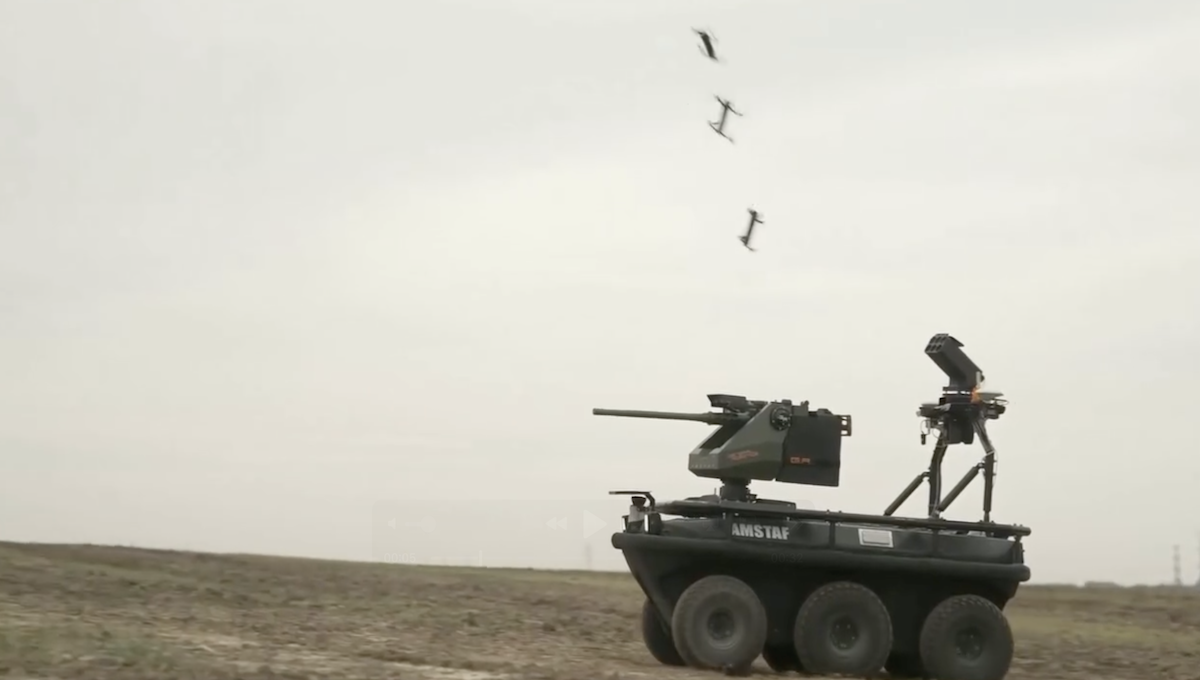 uvg with mini gun and drone launcher