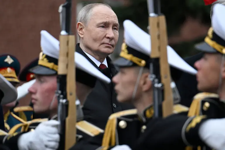 Vladimir Putin at the 2026 Victory Day parade in Moscow, presiding over Russia's smallest military parade in decades amid mounting war fatigue