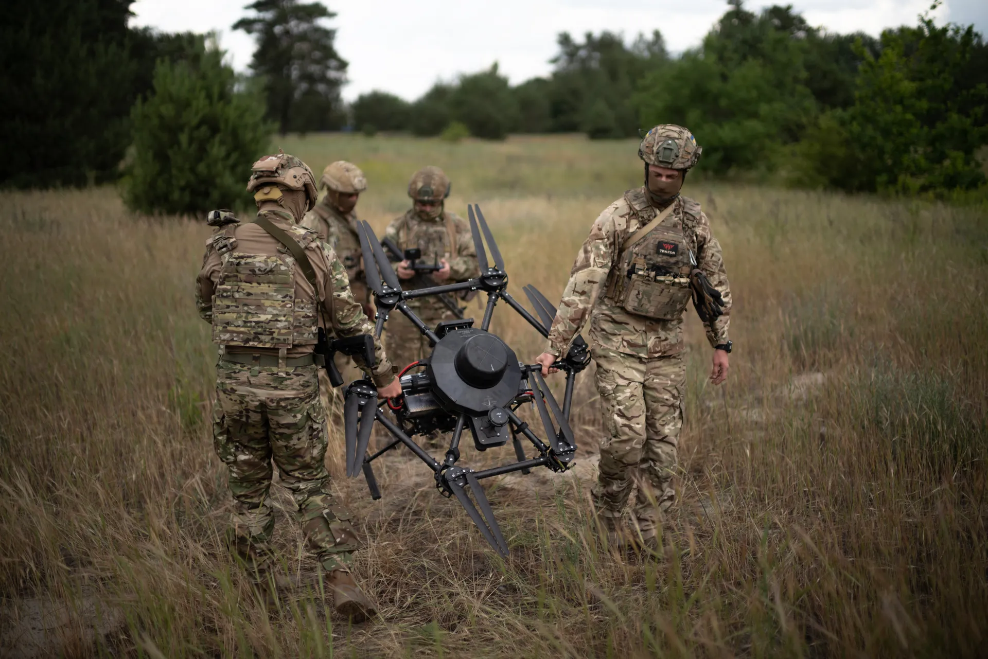 Ukrainian private defense company personnel conducting drone operator training, part of Ukraine's war-built defense services industry that operates in a legal gray zone in 2026